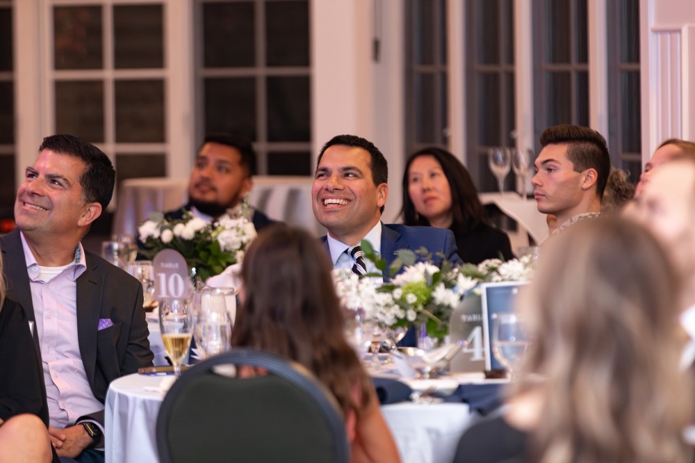 Victor Cardenas smiling at screen